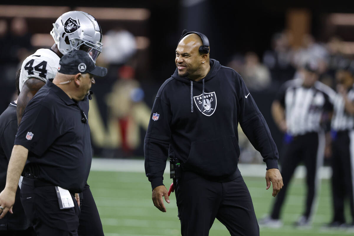 Las Vegas Raiders head coach Antonio Pierce reacts on the sideline during the second half of an ...