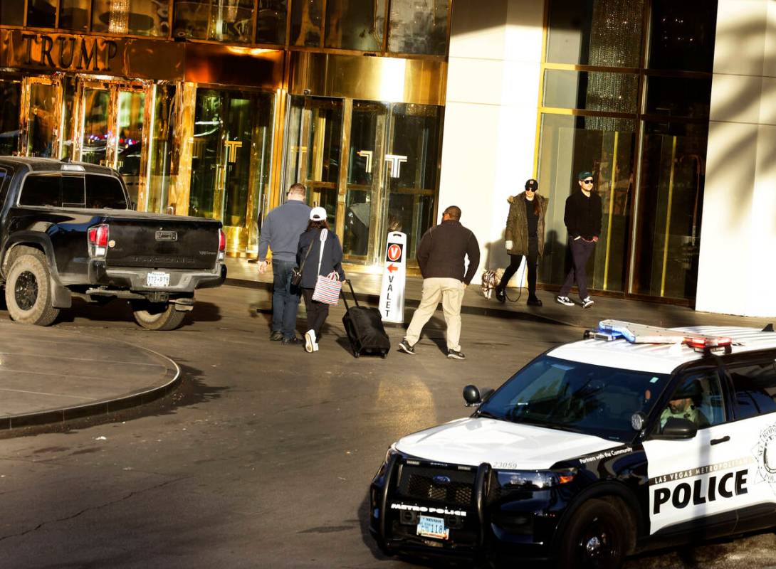 Guests are seen at the valet area outside Trump International Hotel in Las Vegas Thursday, Jan. ...