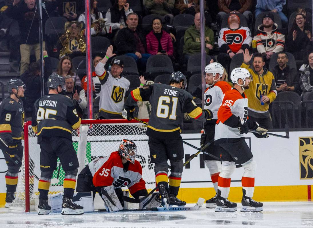 Golden Knights right wing Mark Stone (61) scores against Philadelphia Flyers goaltender Aleksei ...