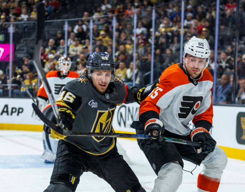 Golden Knights Wing Jonas Rondbjerg (46) battles for the puck with Philadelphia Flyers defensem ...