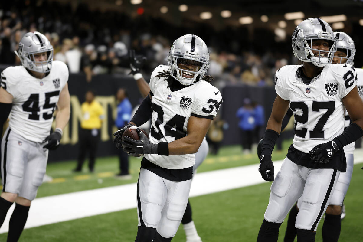 Las Vegas Raiders safety Thomas Harper (34) celebrates after a play during an NFL football game ...