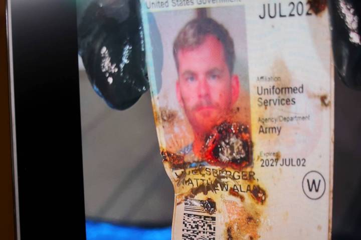 A photo of the military ID belonging to Matthew Alan Livelsberger is shown as Sheriff Kevin McM ...