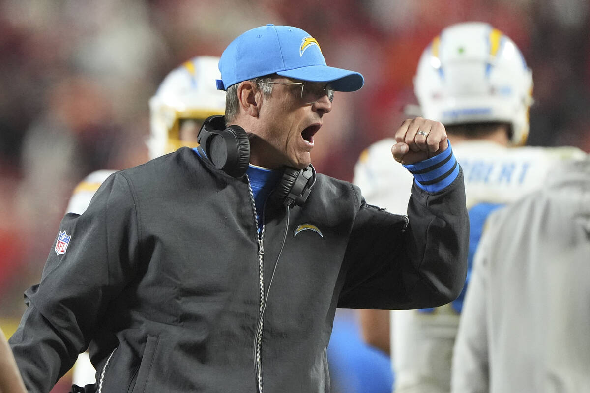 Los Angeles Chargers head coach Jim Harbaugh celebrates after a Chargers touchdown during the s ...