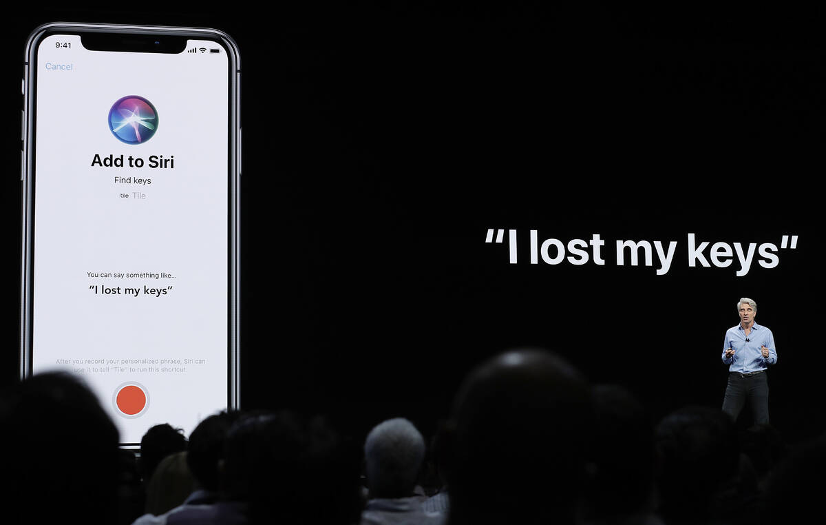 Craig Federighi, Apple's senior vice president of Software Engineering, speaks about Siri durin ...