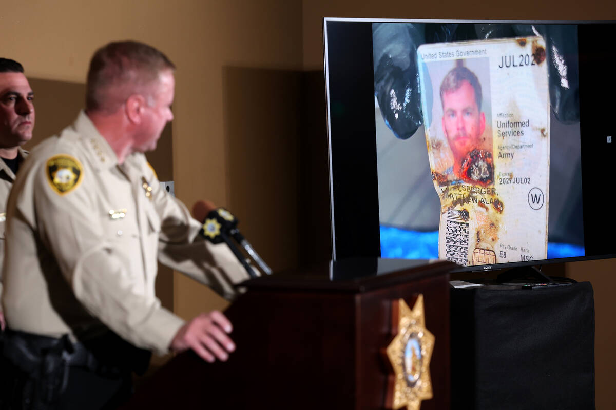 Sheriff Kevin McMahill shows a photo of the military ID of Alan Livelsberger, who died in a Tes ...