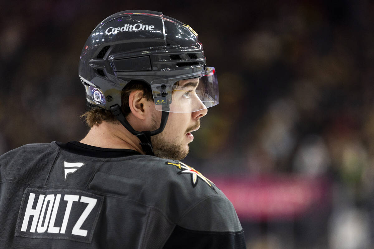 Golden Knights right wing Alexander Holtz (26) waits for a face-off during the third period of ...