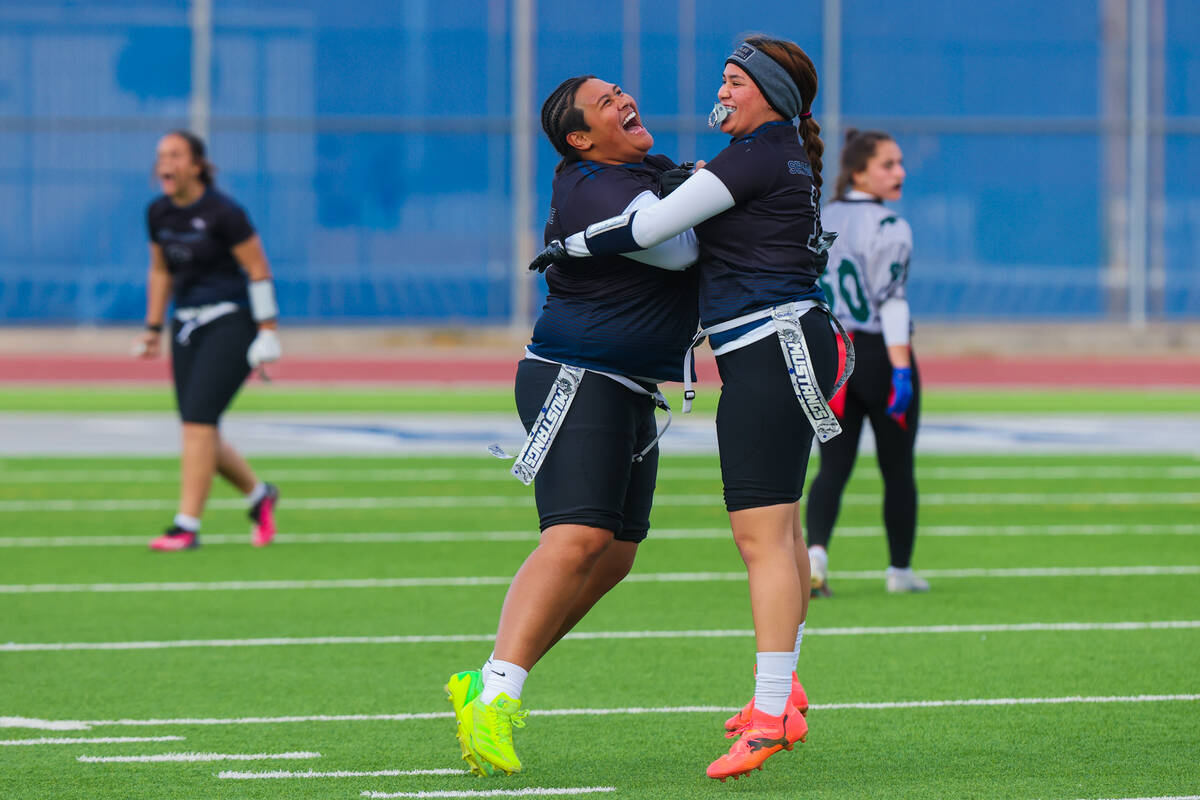 Shadow Ridge teammates celebrate a play during a flag football game between Palo Verde and Shad ...