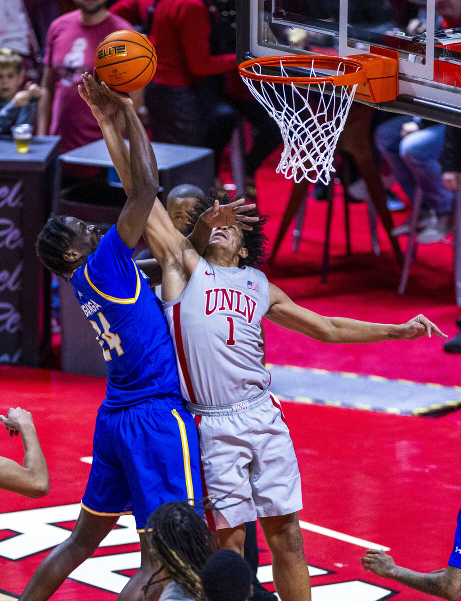 San Jose State Spartans forward Sadraque NgaNga (24) battles on the boards for a shot attempt a ...