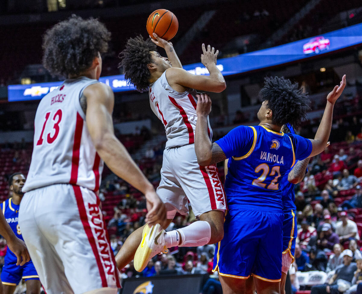 UNLV forward Jalen Hill (1) elevates to shoot over San Jose State Spartans center Robert Vaihol ...