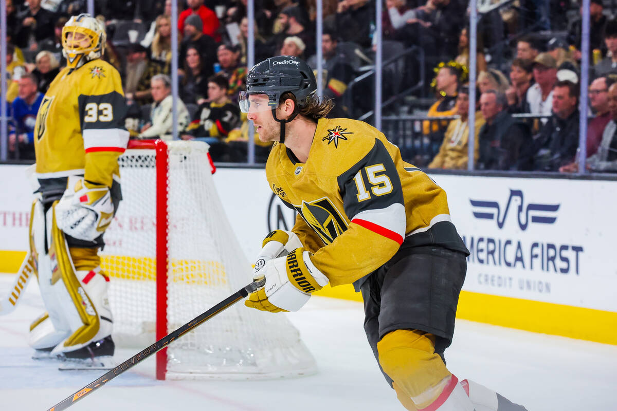 Golden Knights defenseman Noah Hanifin (15) hurries to the other side of the ice during an NHL ...