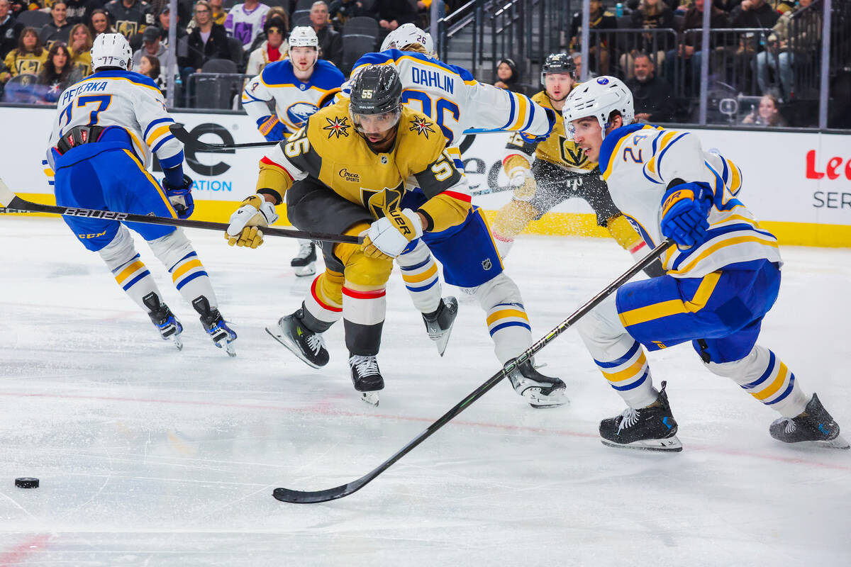 Golden Knights right wing Keegan Kolesar (55) eyes the puck during an NHL hockey game between t ...