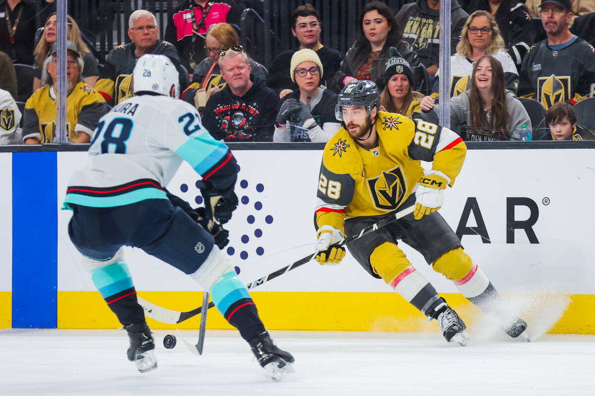 Golden Knights center Tanner Laczynski (28) moves the puck during an NHL hockey game between th ...