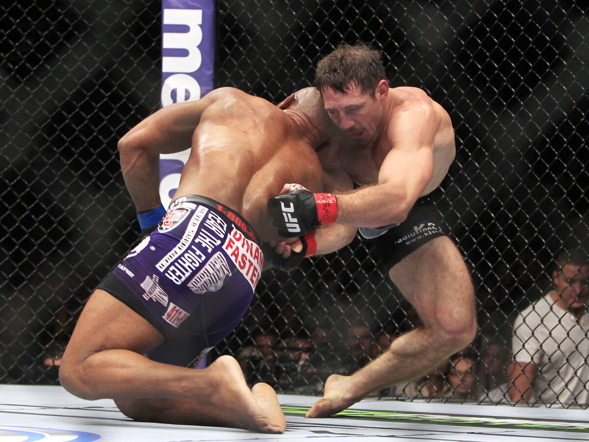 Yoel Romero and Tim Kennedy try to get position during their fight at UFC 178 Saturday, Sept. 2 ...