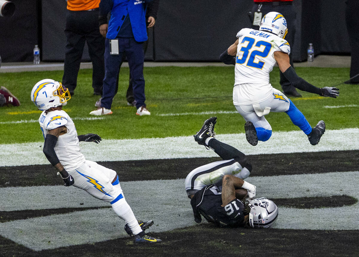 Raiders wide receiver Jakobi Meyers (16) secures a touchdown pass Los Angeles Chargers safety A ...