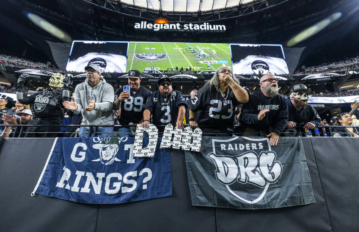 Raiders fans cheer the team on against the Los Angeles Chargers during the second half of their ...