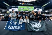 Raiders fans cheer the team on against the Los Angeles Chargers during the second half of their ...