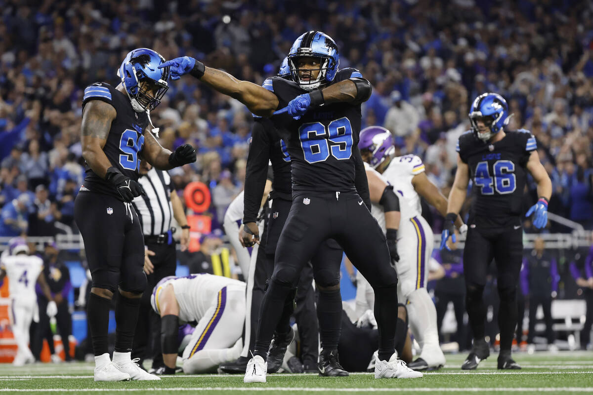 Detroit Lions linebacker Al-Quadin Muhammad (69) celebrates after helping to sack Minnesota Vik ...