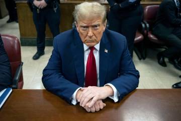 FILE - Former President Donald Trump waits for the start of proceedings in Manhattan criminal c ...