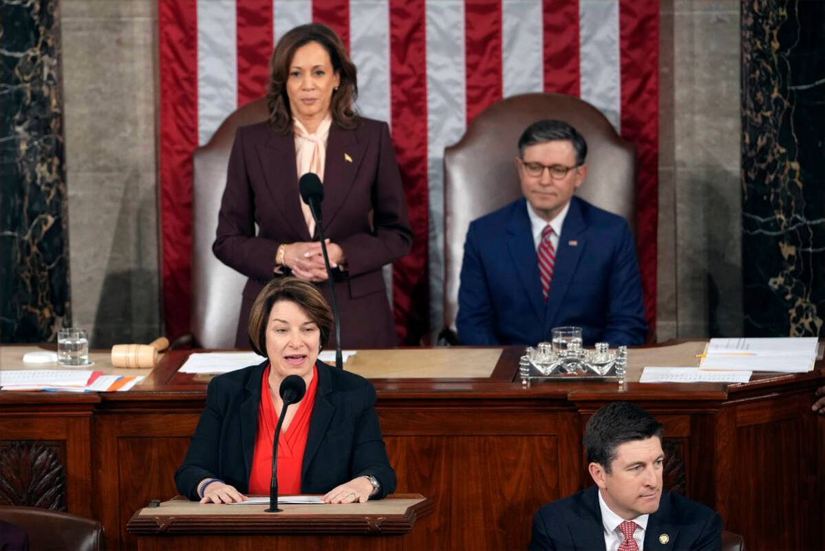 Vice President Kamala Harris and House Speaker Mike Johnson, R-La., listen as Sen. Amy Klobucha ...