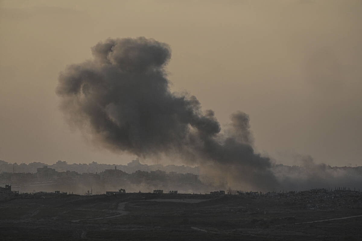 Smoke rises following an Israeli airstrike in the Gaza Strip, as seen from Sderot, southern Isr ...