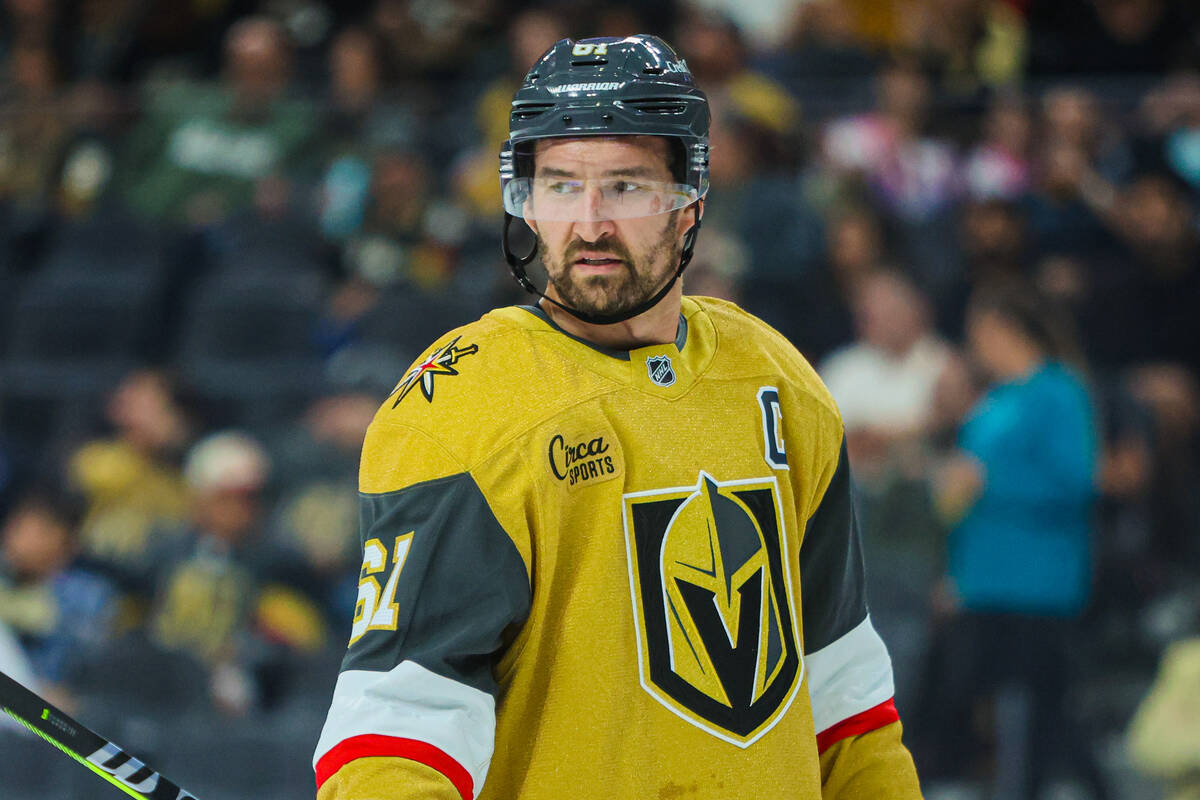 Golden Knights right wing Mark Stone (61) readies himself for a puck drop during the first peri ...