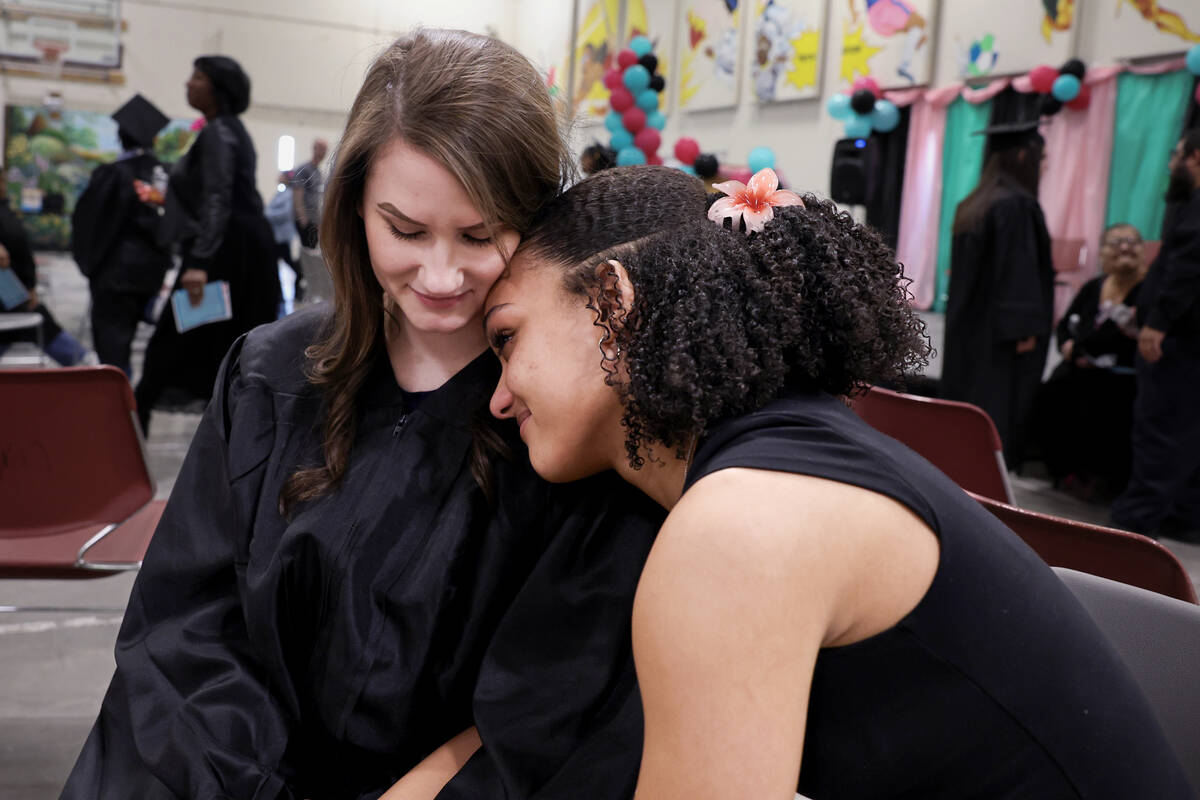 Melanie Costantini, an inmate at Florence McClure Women’s Correctional Center, cries with her ...