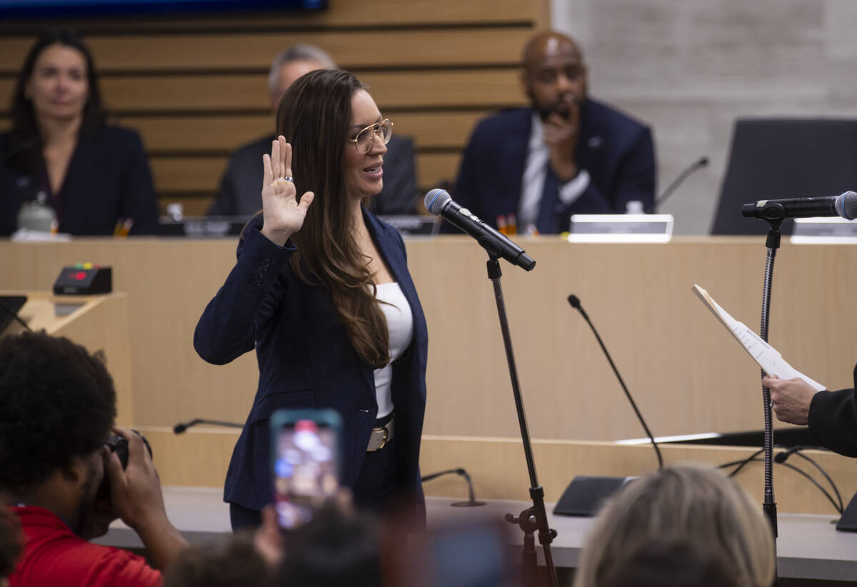 New Clark County School Board trustee Emily Stevens is sworn in during a school board meeting M ...