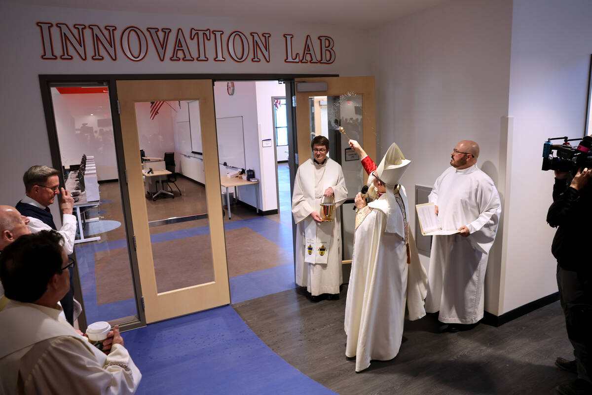 Bishop Greg Gordon, auxiliary bishop of the Archdiocese of Las Vegas, blesses the Innovation La ...