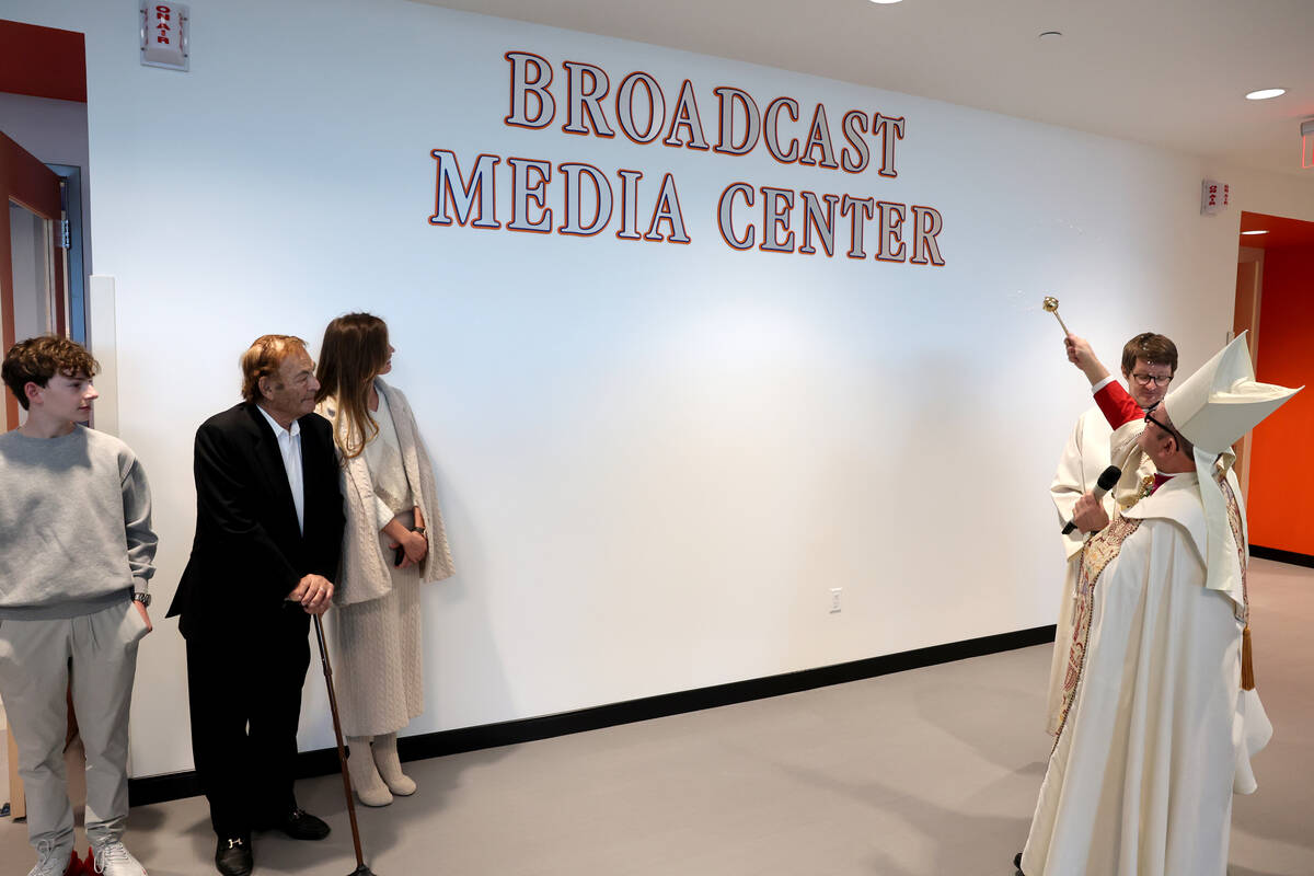 Bishop Greg Gordon, auxiliary bishop of the Archdiocese of Las Vegas, blesses the Broadcast Med ...