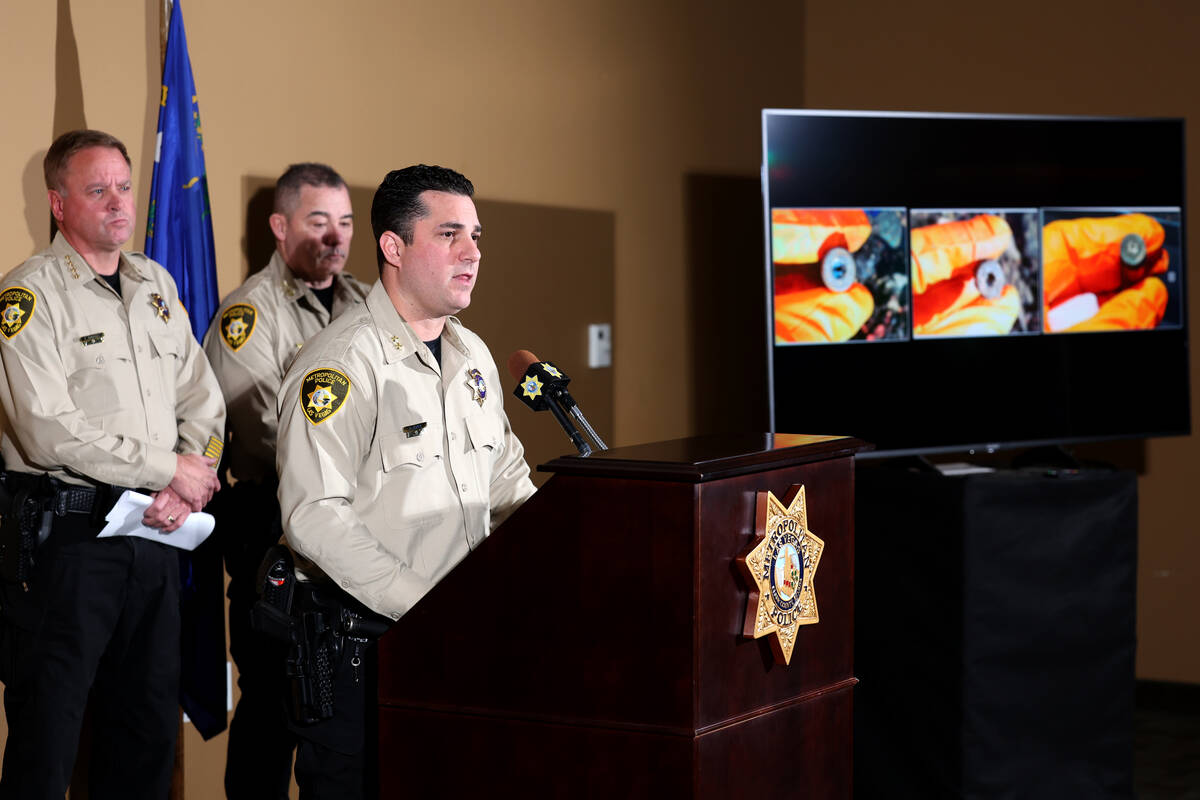 Metropolitan Police Department Assistant Sheriff Dori Koren shows a photo at Metropolitan Poli ...