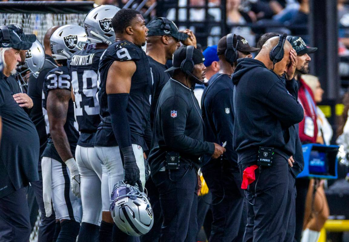 Raiders head coach Antonio Pierce puts his hand to his forehead on the sidelines asa the Los An ...