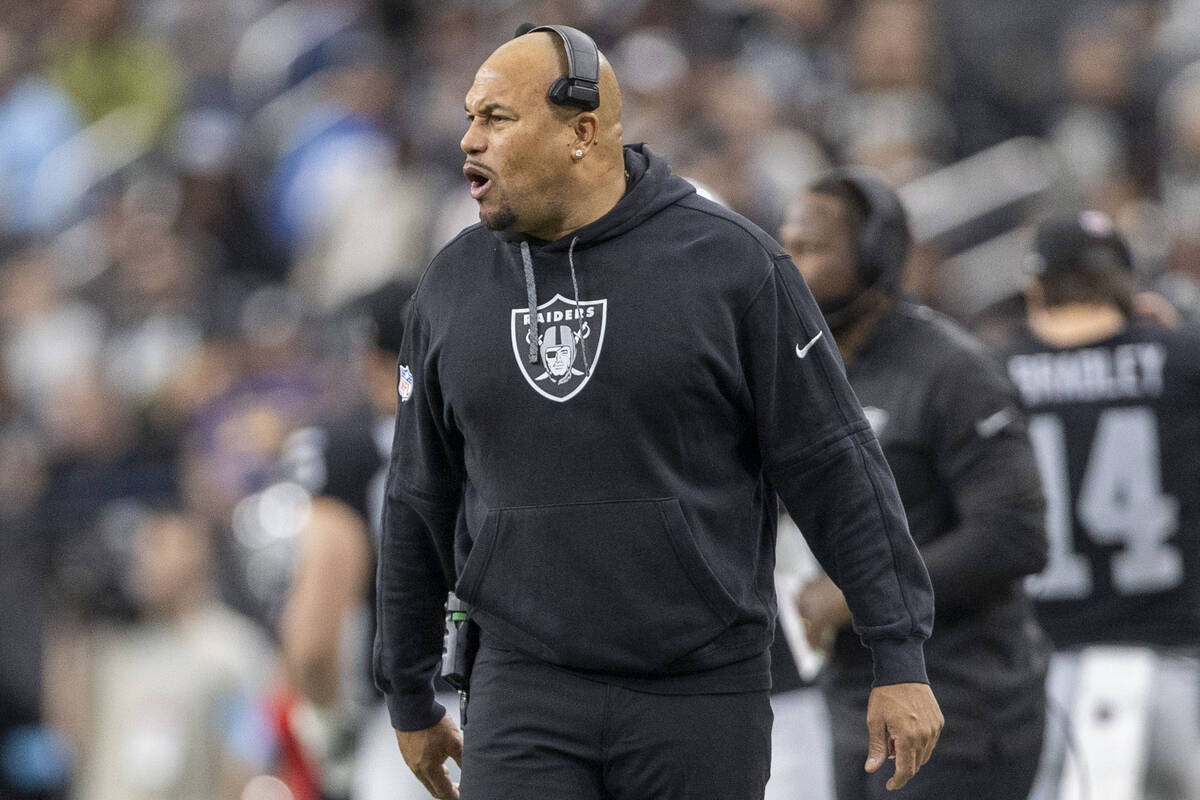 Raiders head coach Antonio Pierce reacts on the sideline during the first half of an NFL game a ...