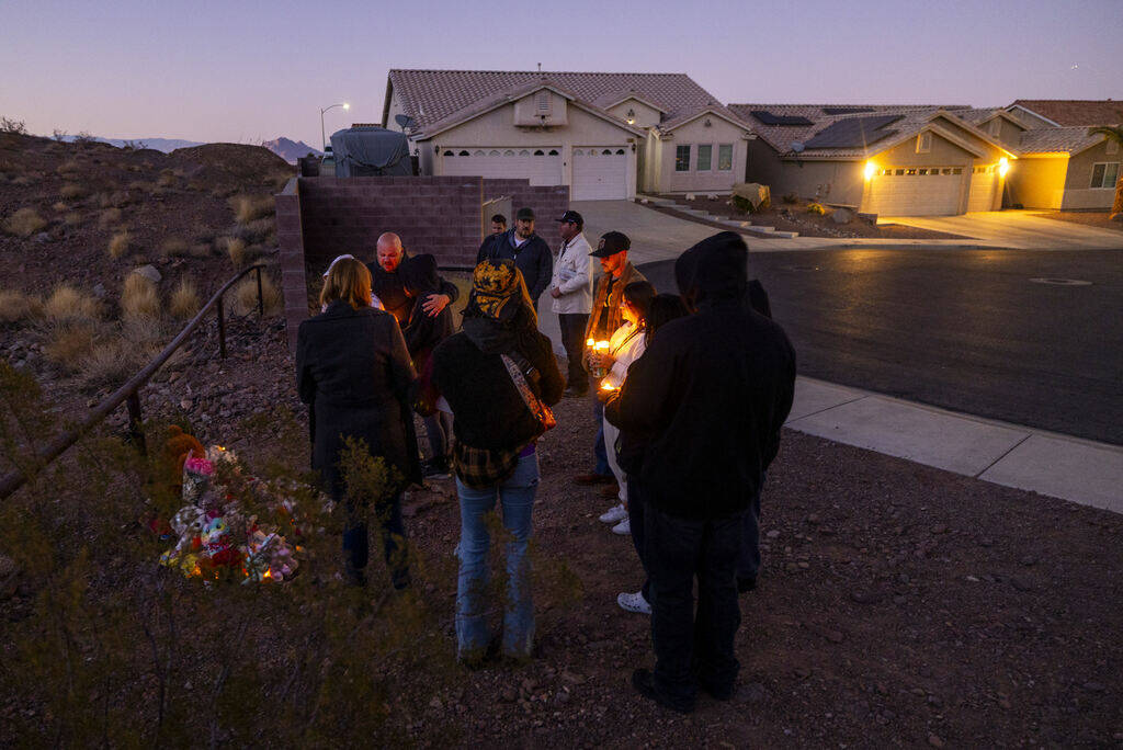 Family and friends gather during a vigil for Jennaleah Hin, 17, who was found dead on Jan. 5, 2 ...