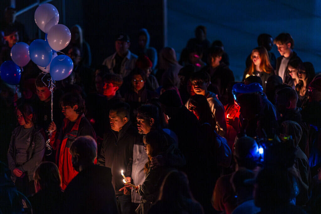 Family and friends gather during a vigil for Jennaleah Hin, 17, who was found dead on Jan. 5, 2 ...