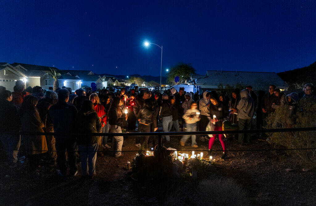 Family and friends gather during a vigil for Jennaleah Hin, 17, who was found dead on Jan. 5, 2 ...