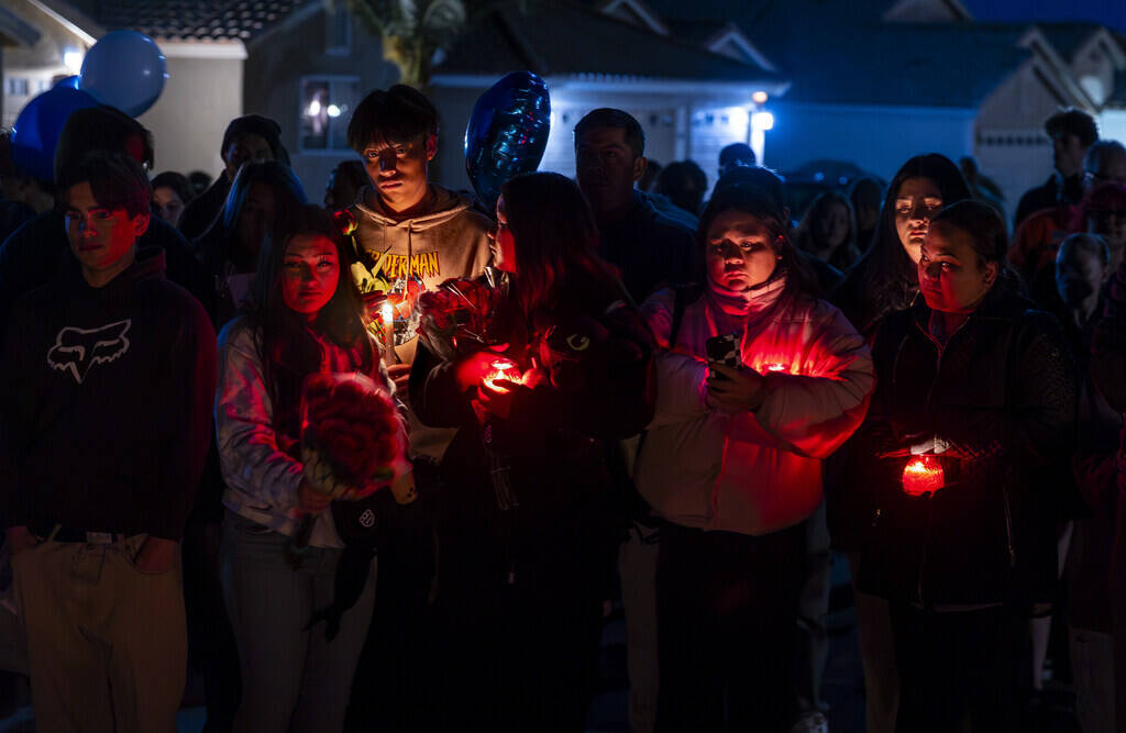 Family and friends gather during a vigil for Jennaleah Hin, 17, who was found dead on Jan. 5, 2 ...