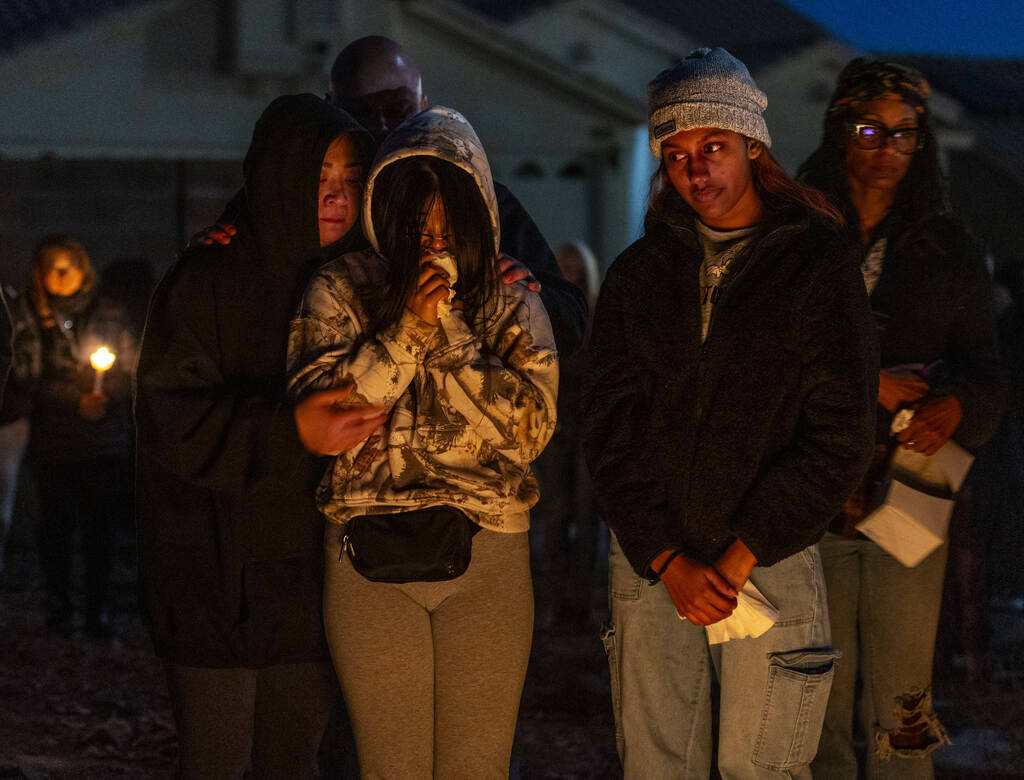 Family and friends gather during a vigil for Jennaleah Hin, 17, who was found dead on Jan. 5, 2 ...