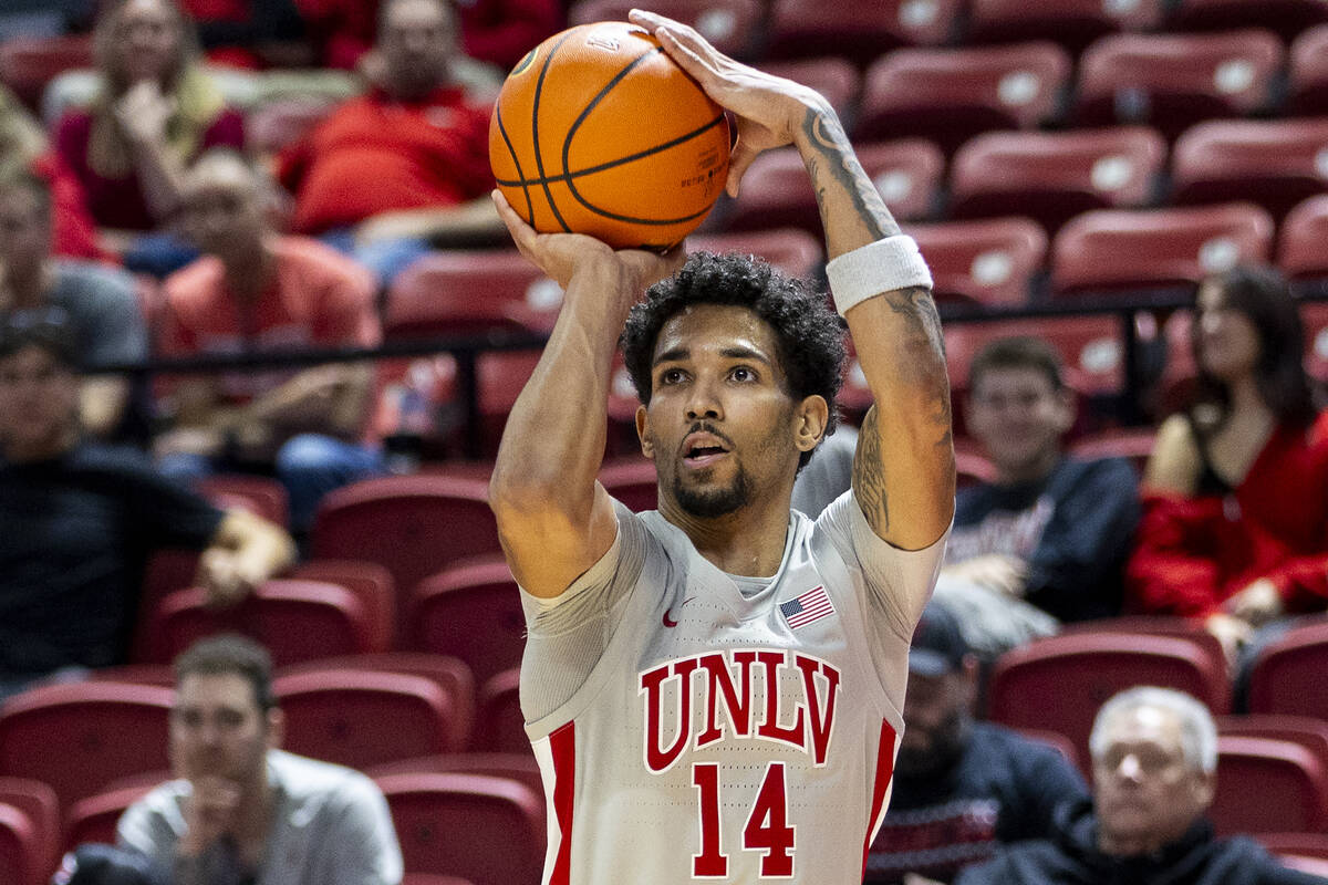 UNLV guard Jailen Bedford (14) attempts a three-point shot during the second half of the colleg ...