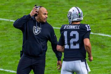 Raiders head coach Antonio Pierce yells to quarterback Aidan O'Connell (12) during the first ha ...