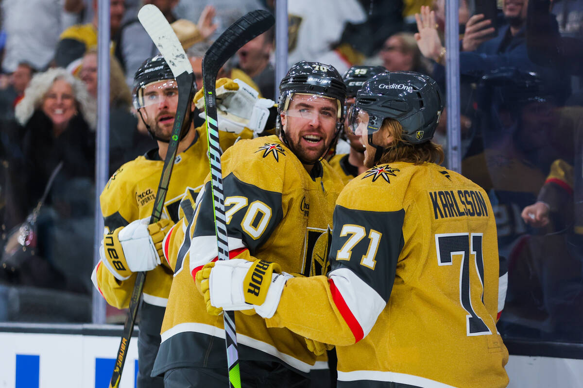 Golden Knights left wing Tanner Pearson (70) celebrates a goal with his teammates by William Ka ...