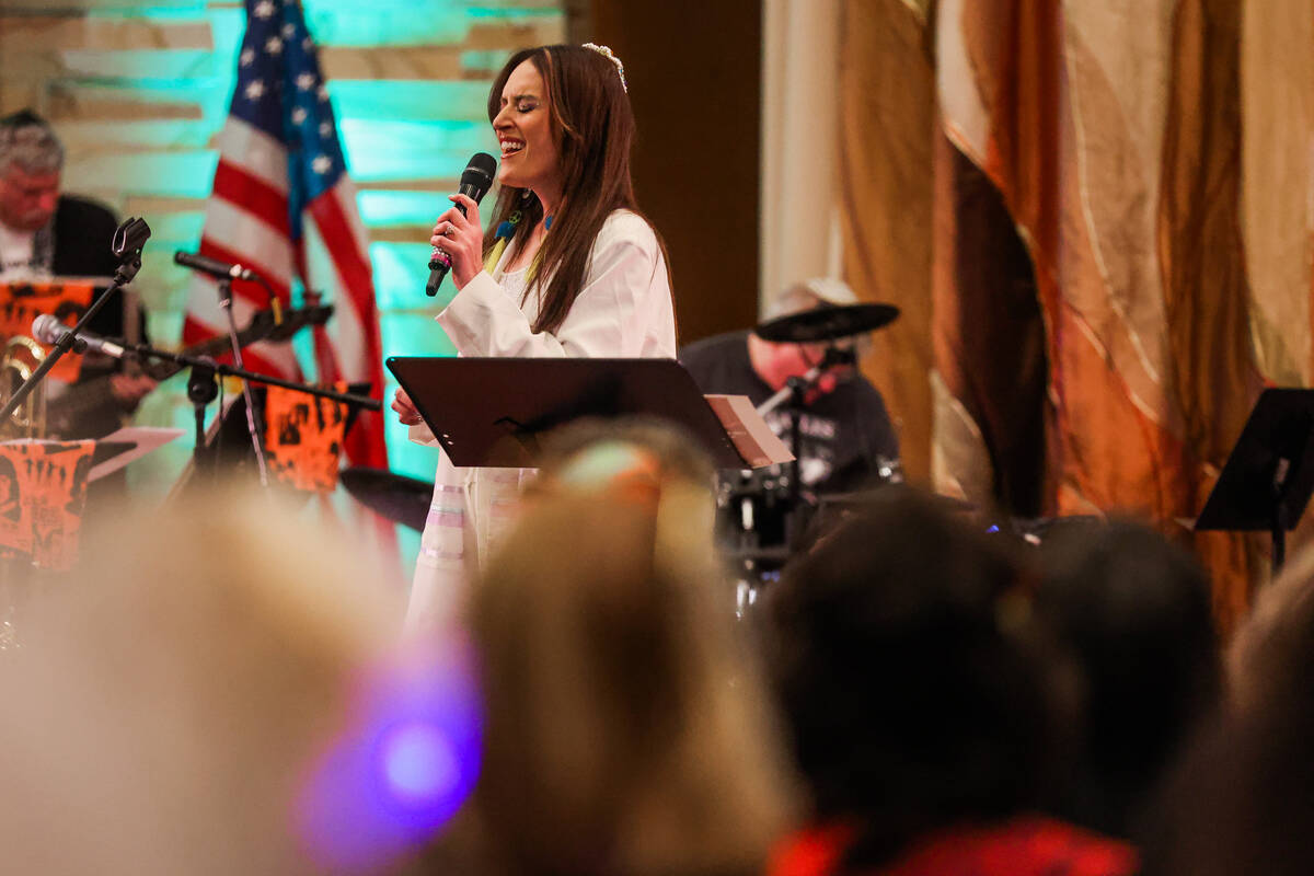 Cantor Jessica Hutchings sings during a Beatles themed Shabbat service at Congregation Ner Tami ...