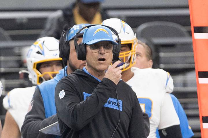 Los Angeles Chargers head coach Jim Harbaugh on from the sideline during the first half of an N ...