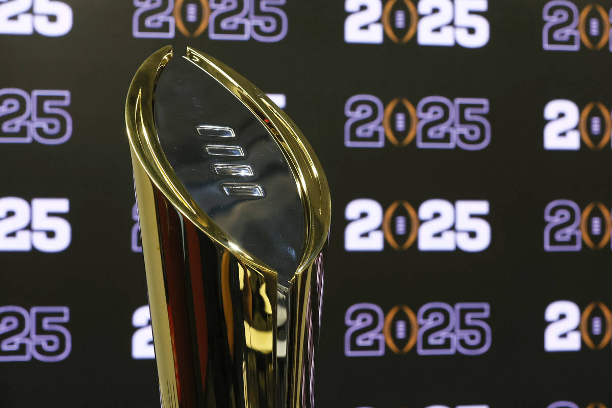 The National Championship Trophy is shown after a news conference at Mercedes-Benz Stadium on A ...