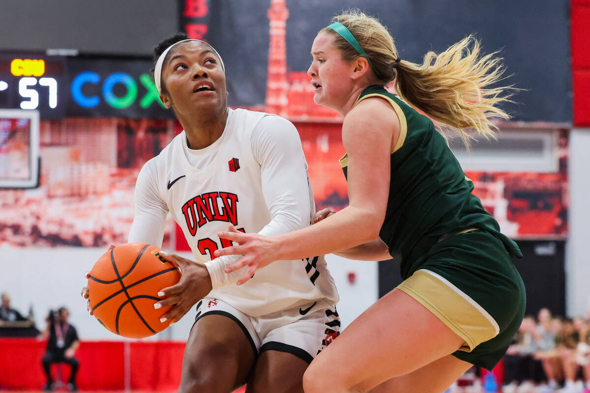 Lady Rebels guard Aaliyah Alexander (25) drives to the basket during an NCAA women’s bas ...