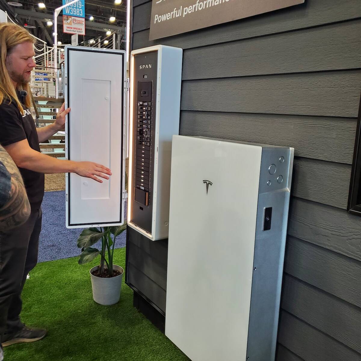 A SPAN smart service panel and a Tesla Powerwall 2 are two electronic devices that can be coupl ...