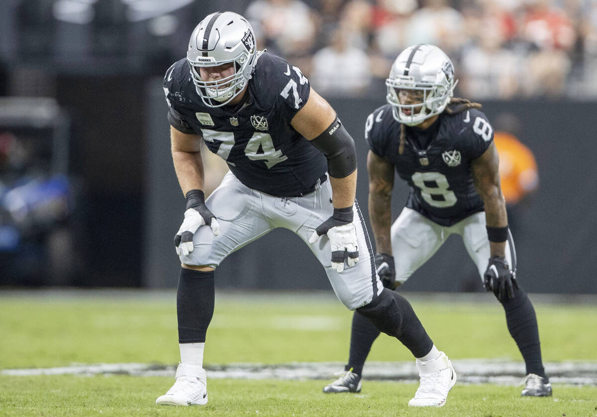 Raiders offensive tackle Kolton Miller (74) lines up with running back Ameer Abdullah (8) in th ...