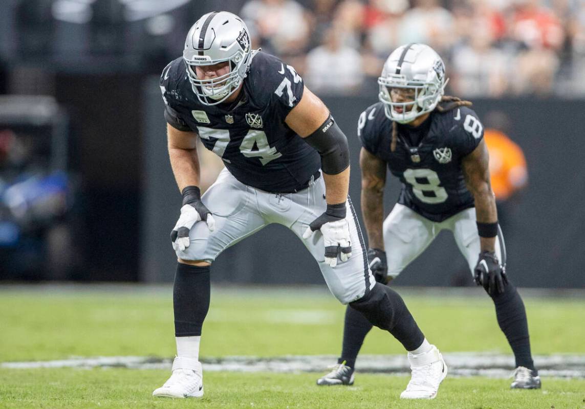 Raiders offensive tackle Kolton Miller (74) lines up with running back Ameer Abdullah (8) in th ...