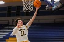 Sierra Vista forward Colton Knoll (10) goes up for a layup during a high school boys basketball ...