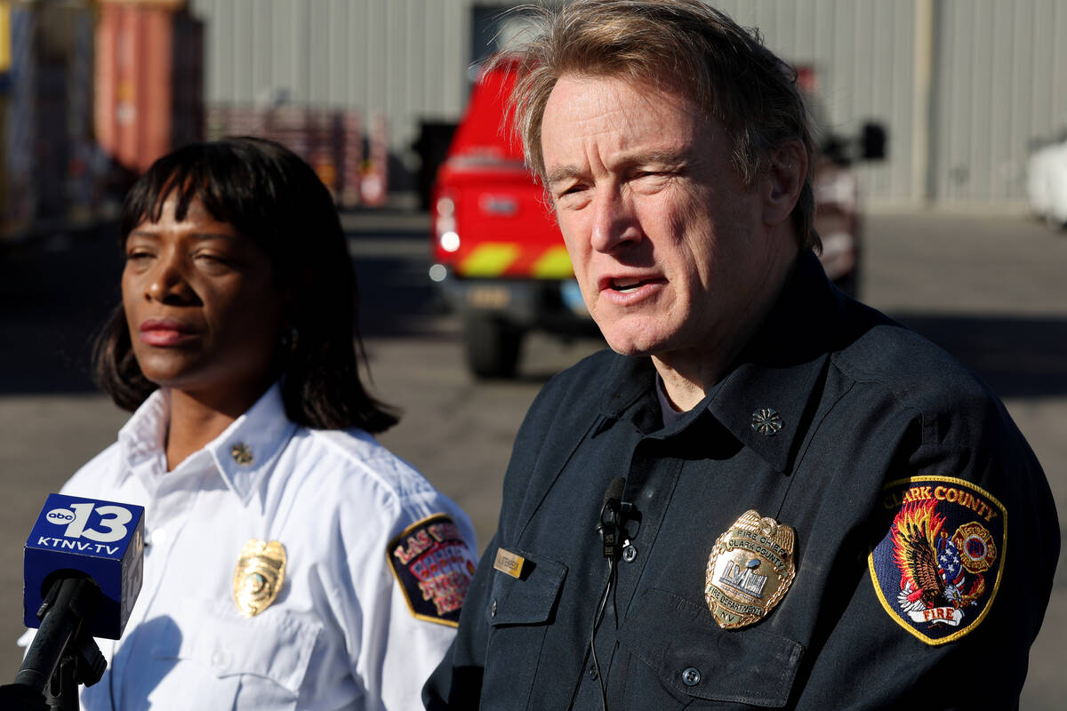 Clark County Fire Department Chief John Steinbeck, right, and Las Vegas Fire and Rescue Deputy ...