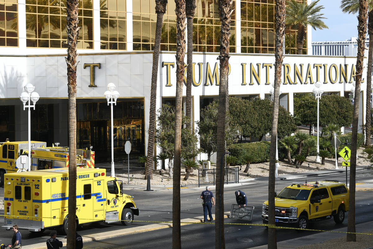 Clark County Fire Department crews are seen outside Trump International Hotel in Las Vegas afte ...